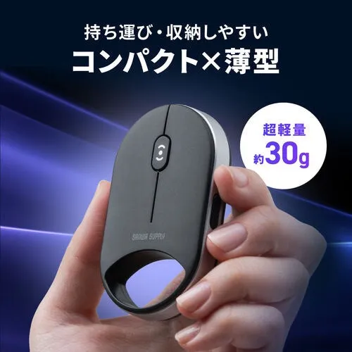 手で持たれた黒いマウスの画像。マウスはコンパクトで薄型であり、約30gと超軽量であると書かれています。