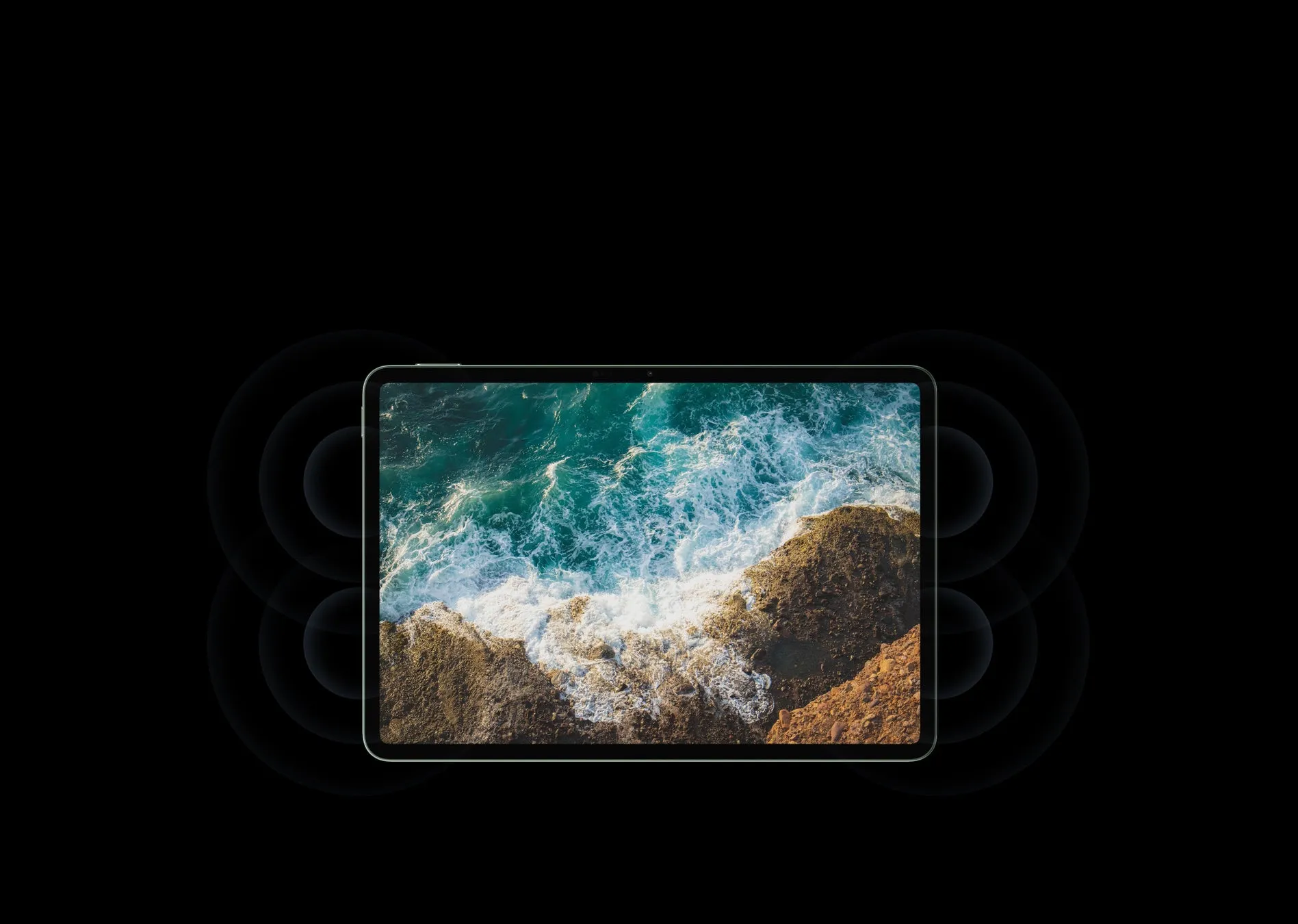 海岸の風景が表示されたタブレット